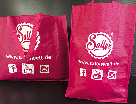 Hochwertige Woben-Tragetasche in Pink mit Logo bedruckt